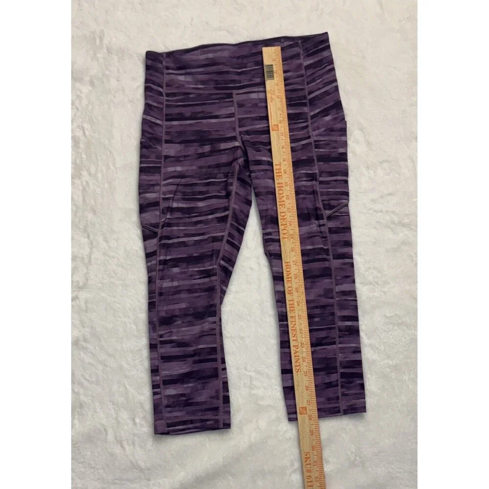 lululemon cropped purple leggings size 8 speed it up zip waist pocket